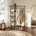 Porte-vêtements Umbra Bellwood noir : cadre en eucalyptus, tringle et étagère fixes, hauteur de 167 cm, capacité de 55 kg, outils de montage inclus