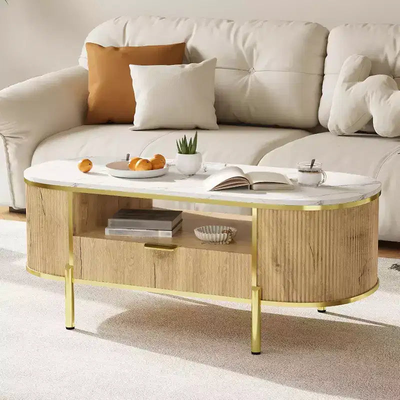 Table basse cannelée moderne COZONY avec tiroir, dessus ovale en faux marbre de 48" et pieds dorés pour salon