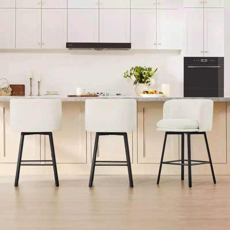 Tabouret de comptoir pivotant Spruce&Spring avec dossier incurvé, assise double épaisseur et piètement en métal