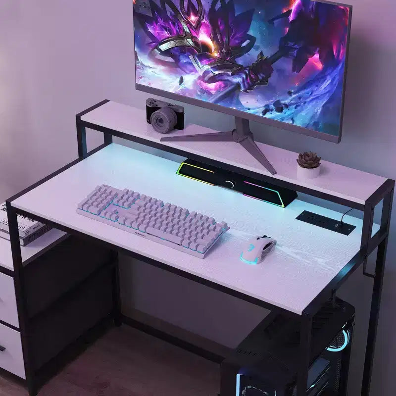 Bureau de jeu LED Famapy, avec cadre en métal, prise de courant intégrée, tiroirs et double plateau surélevé