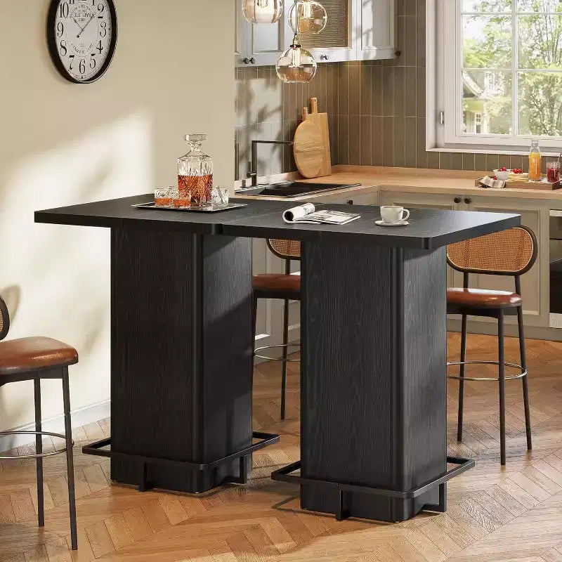 Table de bar carrée Lantine, table de bistrot/pub haute de 99,99 cm en bois avec repose-pieds en métal pour salle à manger, café, cocktail, salon, petits espaces