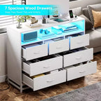 Commode à 7 tiroirs, Commode en bois avec lumières LED et station de charge, Commode avec grande capacité de rangement pour chambre, salon, couloir