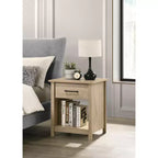 This Celeste 20W Light Oak Finish 1-Drawer Nightstand Bedside Table combines contemporary style with smart storage solutions, creating a space.