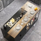 Îlot de cuisine avec tiroirs et placards vitrés, transformable en bureau