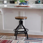 Lot de 2 tabourets de bar réglables Tormo en métal et bois vieilli noirs - Powell : pivotants, assise ronde, design industriel