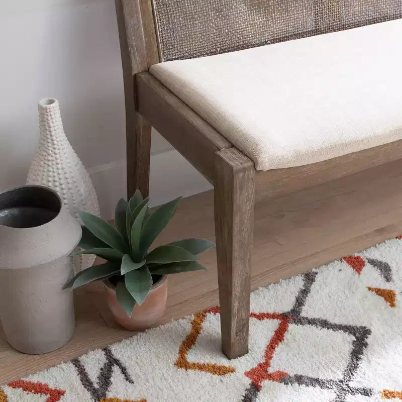 Banc rembourré en rotin et polyester de 52 po Bessie en bois massif, marron - Powell : dossier en cannage, conception en bois