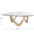 Table basse abstraite Olivia & May Cement avec base abstraite ondulée et plateau en verre triangulaire beige