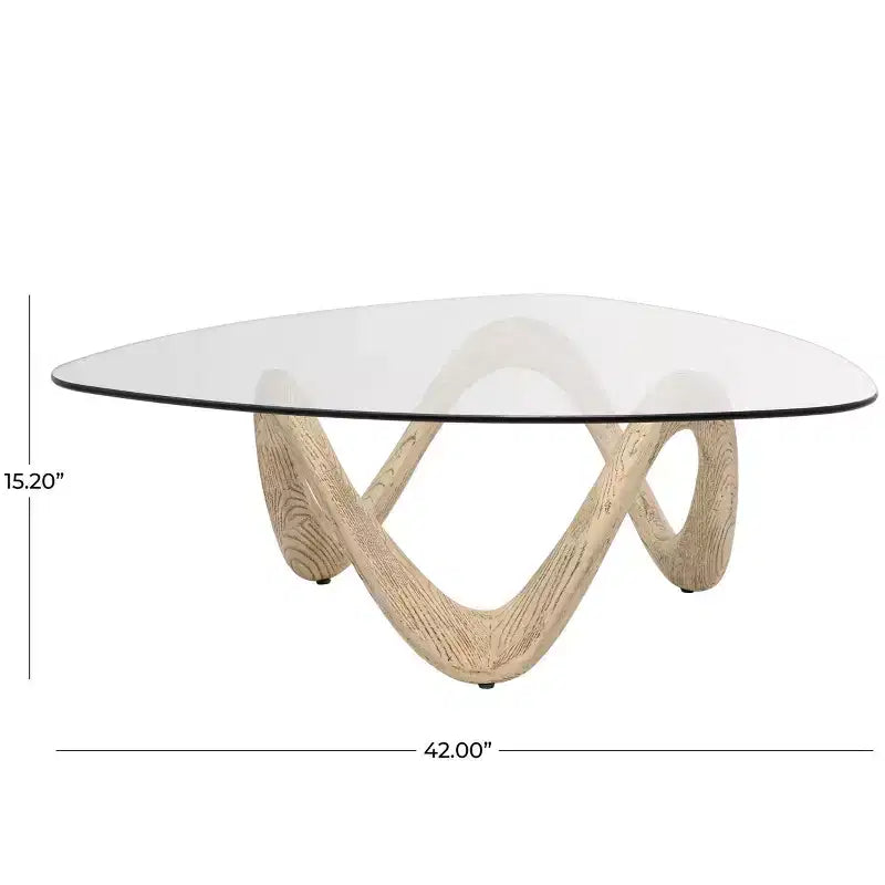 Table basse abstraite Olivia & May Cement avec base abstraite ondulée et plateau en verre triangulaire beige