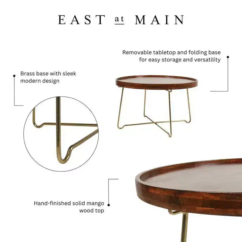 Table basse ronde East at Main 32,38 po naturel/doré : Plateau en bois de manguier, base en laiton entrecroisé, aucun assemblage requis