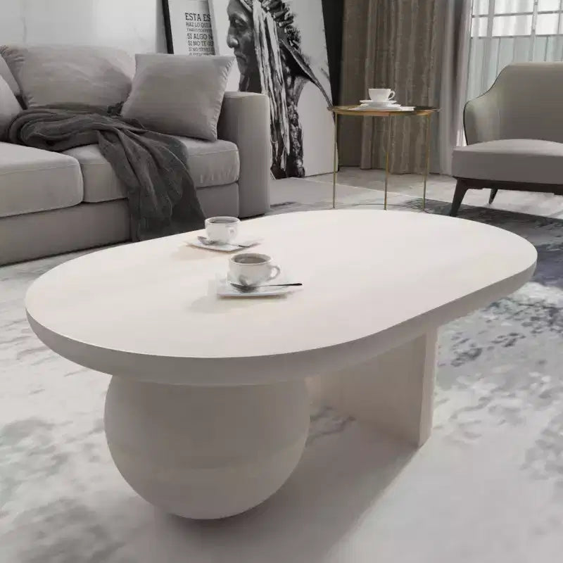 Table basse Urban Port de 96,5 cm avec plateau oblong en bois de manguier et pieds boules modernes, coloris blanc délavé