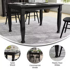 Table à manger en bois Merrick Lane avec pieds sculptés