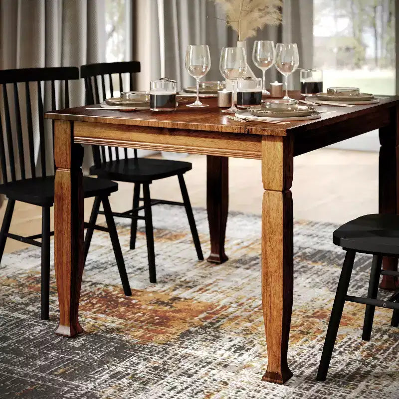 Table à manger en bois Merrick Lane avec pieds sculptés