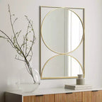Miroir mural accent moderne en métal cadre sablier doré LuxenHome