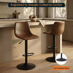 Tabouret de bar moderne LeisureMod Tilbury réglable en hauteur avec revêtement en cuir végétalien et repose-pieds, idéal pour îlot de cuisine, comptoir ou bar à domicile
