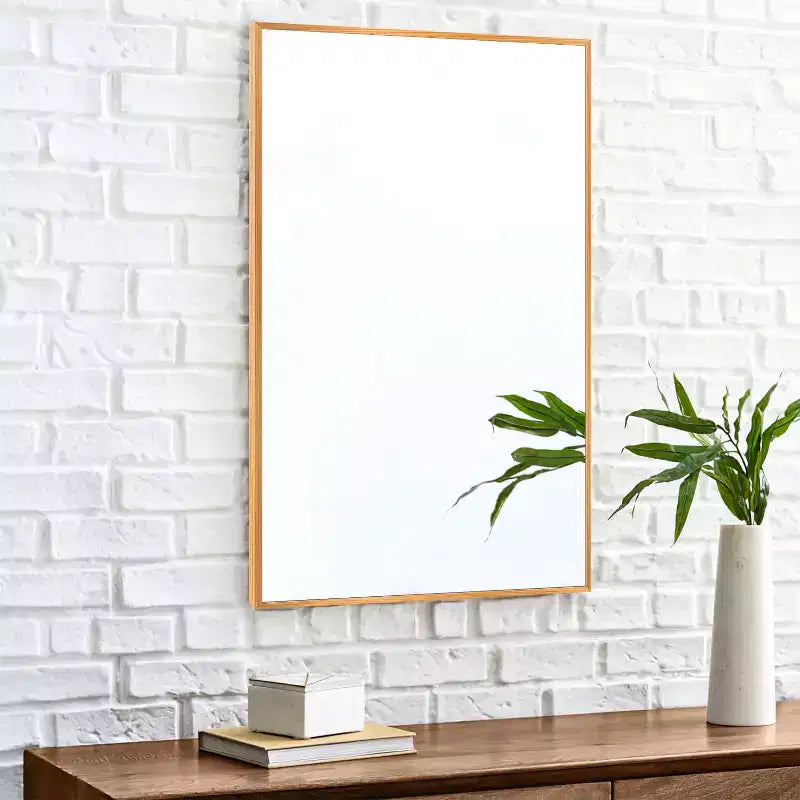Miroir mural décoratif rectangulaire Dovelina à cadre métallique moderne