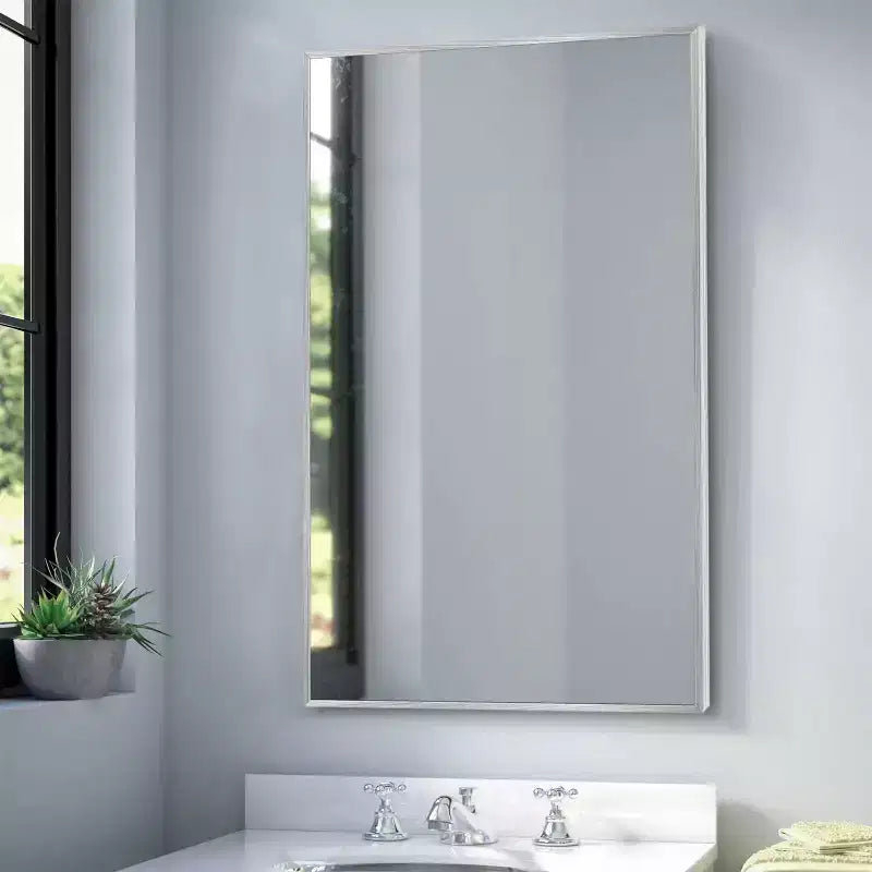 Miroir mural décoratif rectangulaire Dovelina à cadre métallique moderne