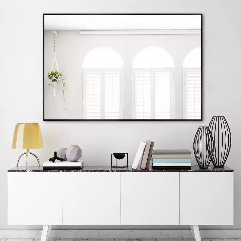 Miroir mural décoratif rectangulaire Dovelina à cadre métallique moderne