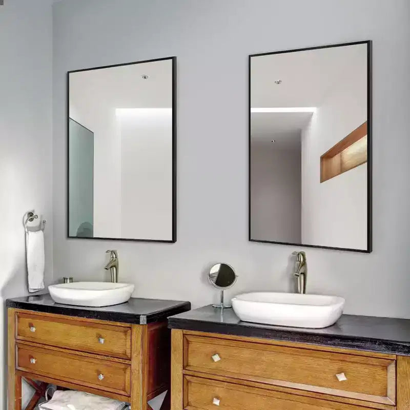 Miroir mural décoratif rectangulaire Dovelina à cadre métallique moderne