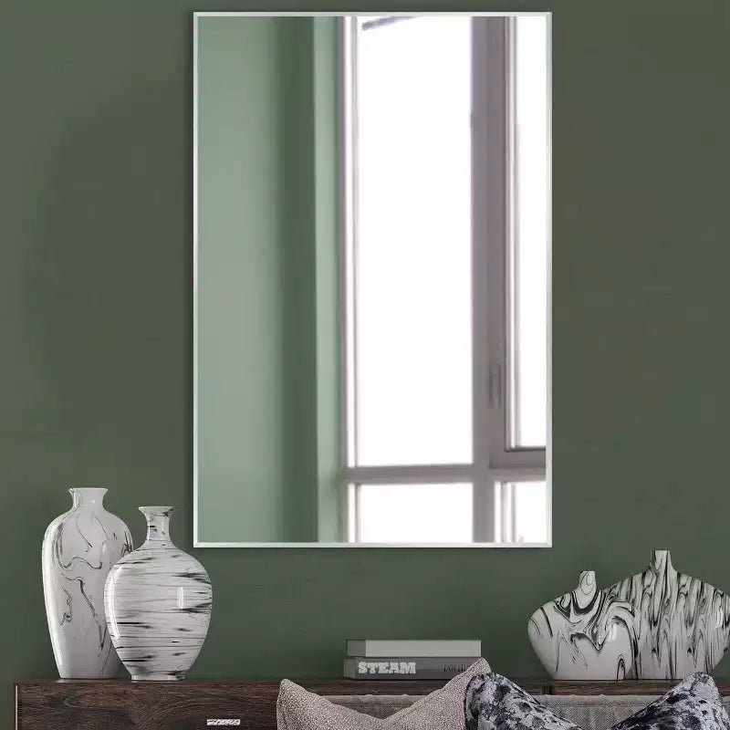 Miroir mural décoratif rectangulaire Dovelina à cadre métallique moderne