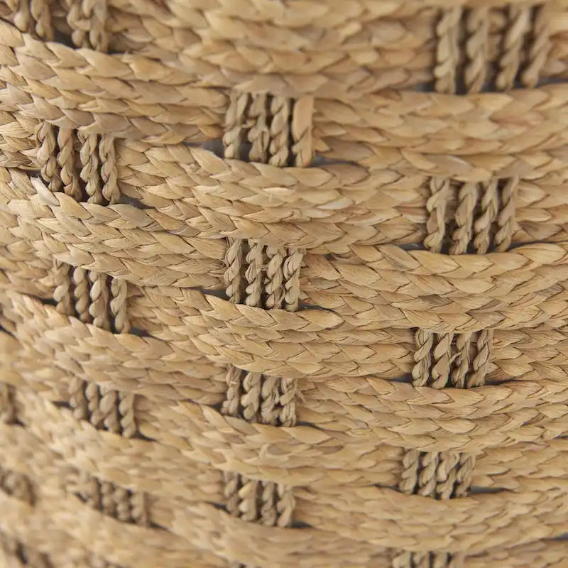 Pouf rond en jonc de mer tressé à motif Mercana Michelle Brown
