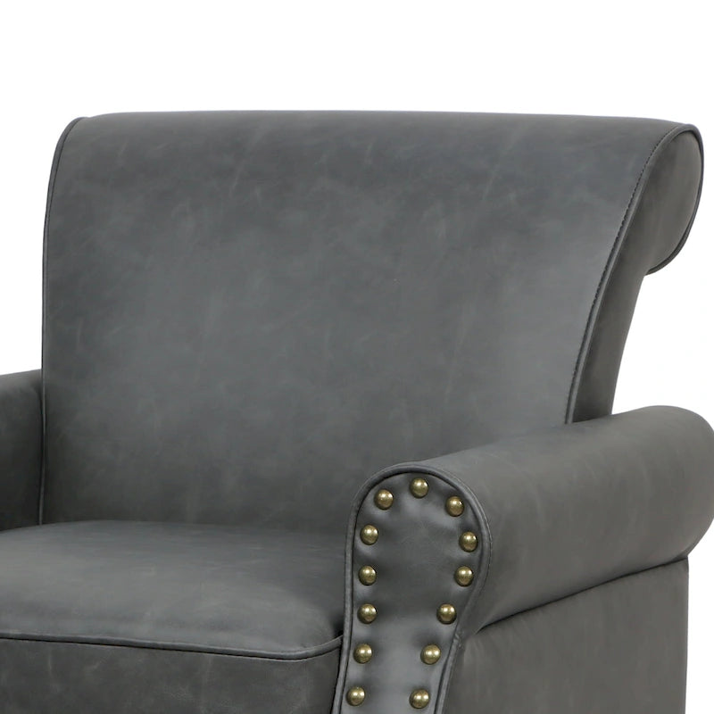Fauteuil club en similicuir à têtes de clou