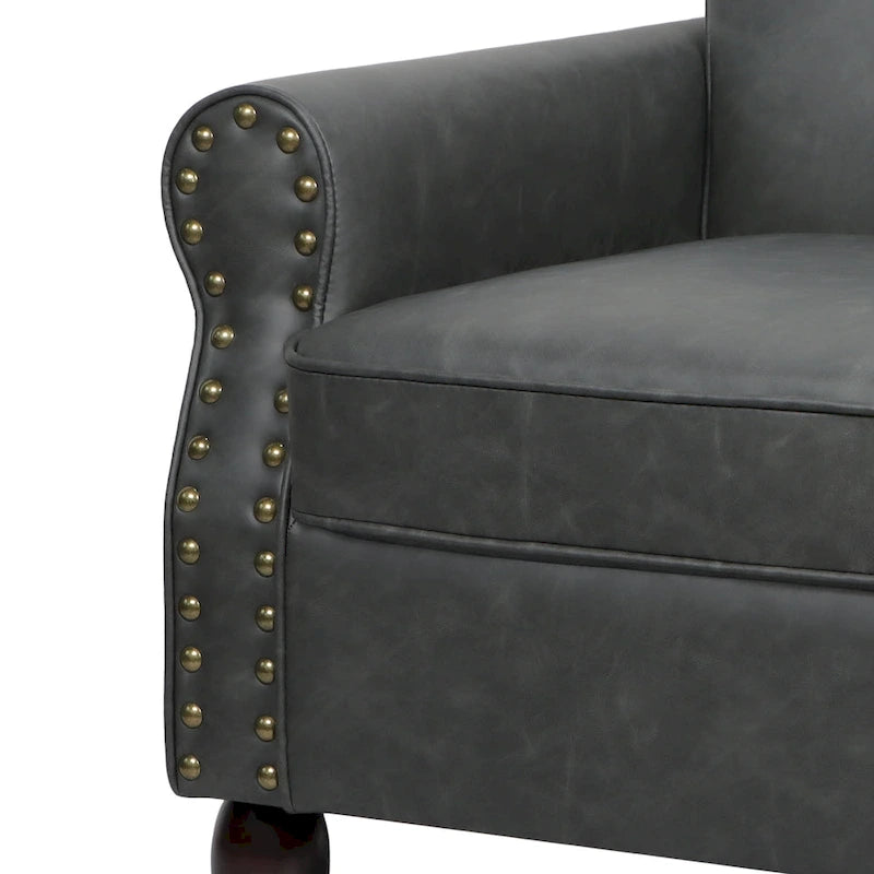 Fauteuil club en similicuir à têtes de clou