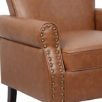 Fauteuil club en similicuir à têtes de clou