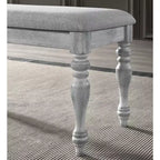 Banc de salle à manger Roundhill Furniture Salines avec pieds tournés et revêtement en tissu, blanc rustique